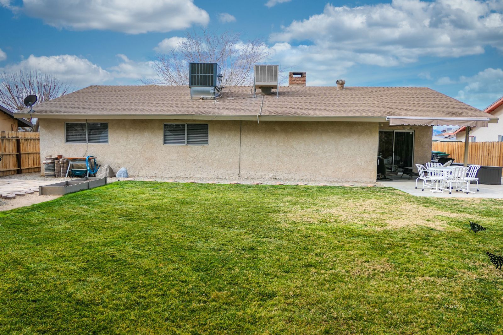 308 South Lilac Street Ridgecrest, CA 93555 - Photo 48 of 50 a front view of a building with garden