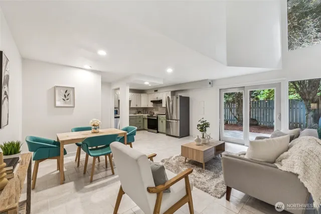 a living room with furniture and a table