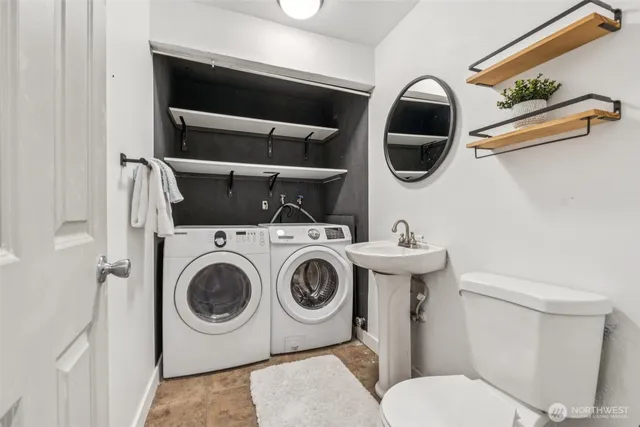 a utility room with dryer and washer