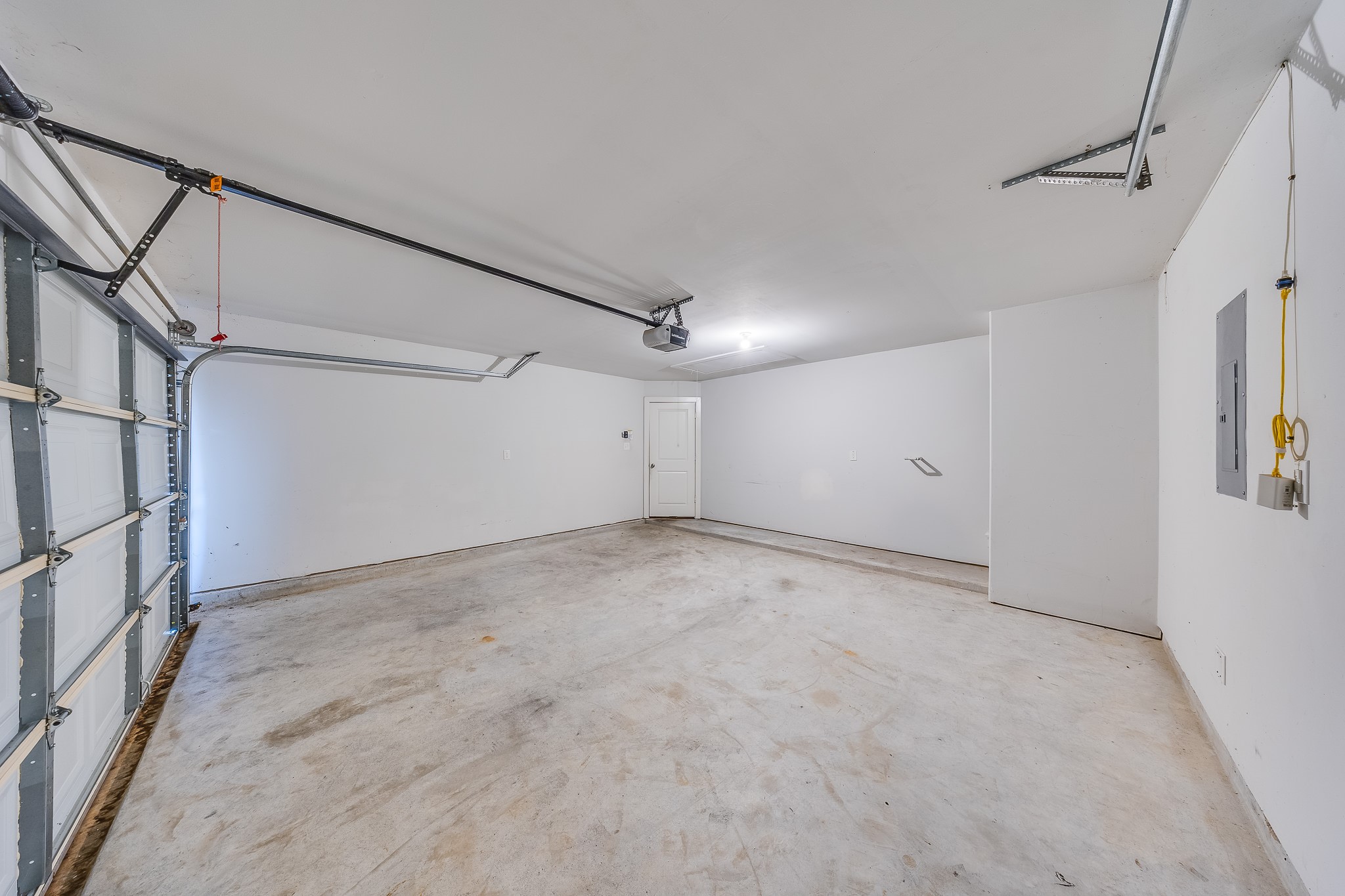 6807 Alamitos Court Rosharon, TX 77583 - Photo 30 of 34 Two-car garage providing secure parking, extra storage space, and convenient access to the home.