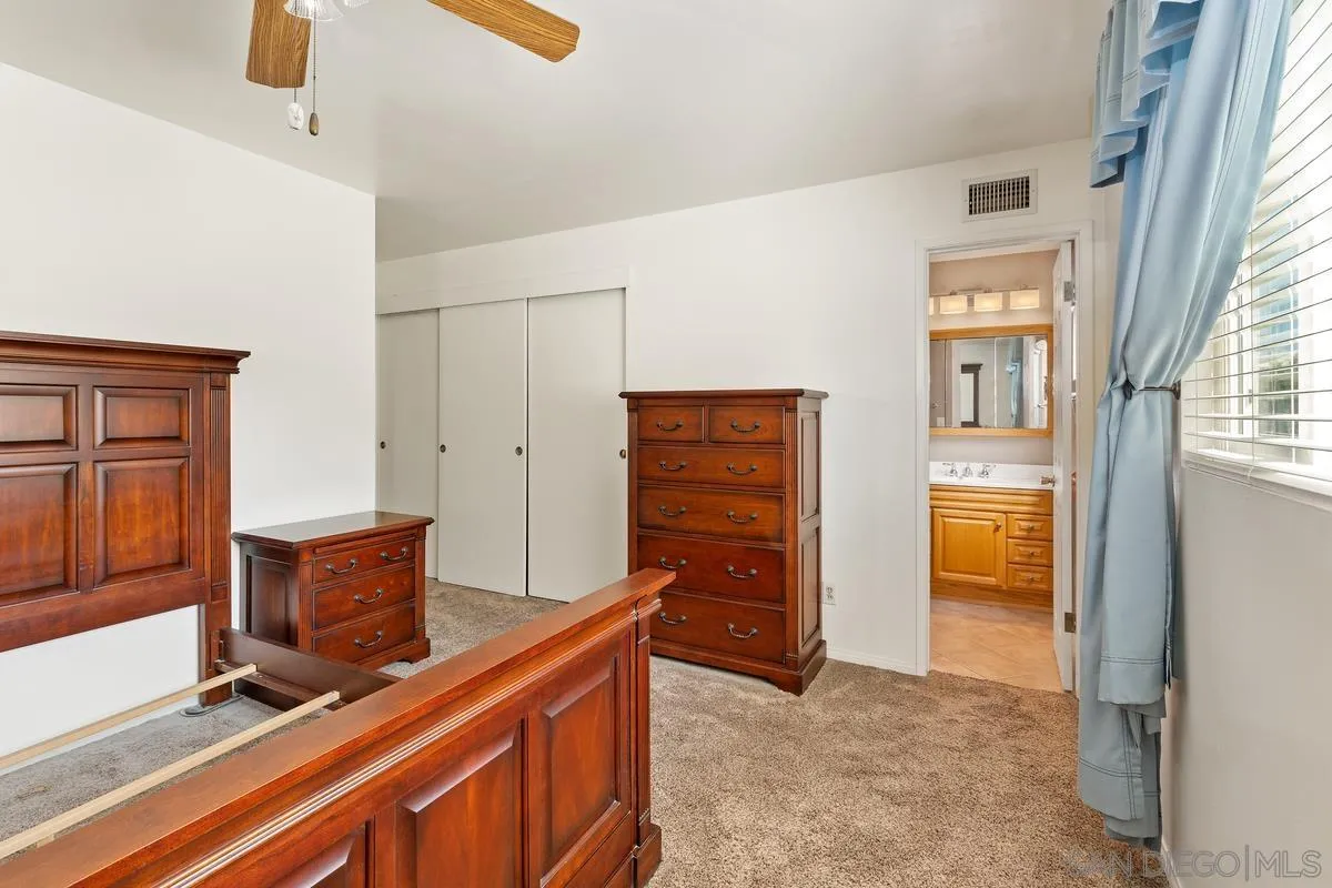 9343 Oakbourne Road Santee, CA 92071 - Photo 15 of 19 a view of room with furniture and wooden floor