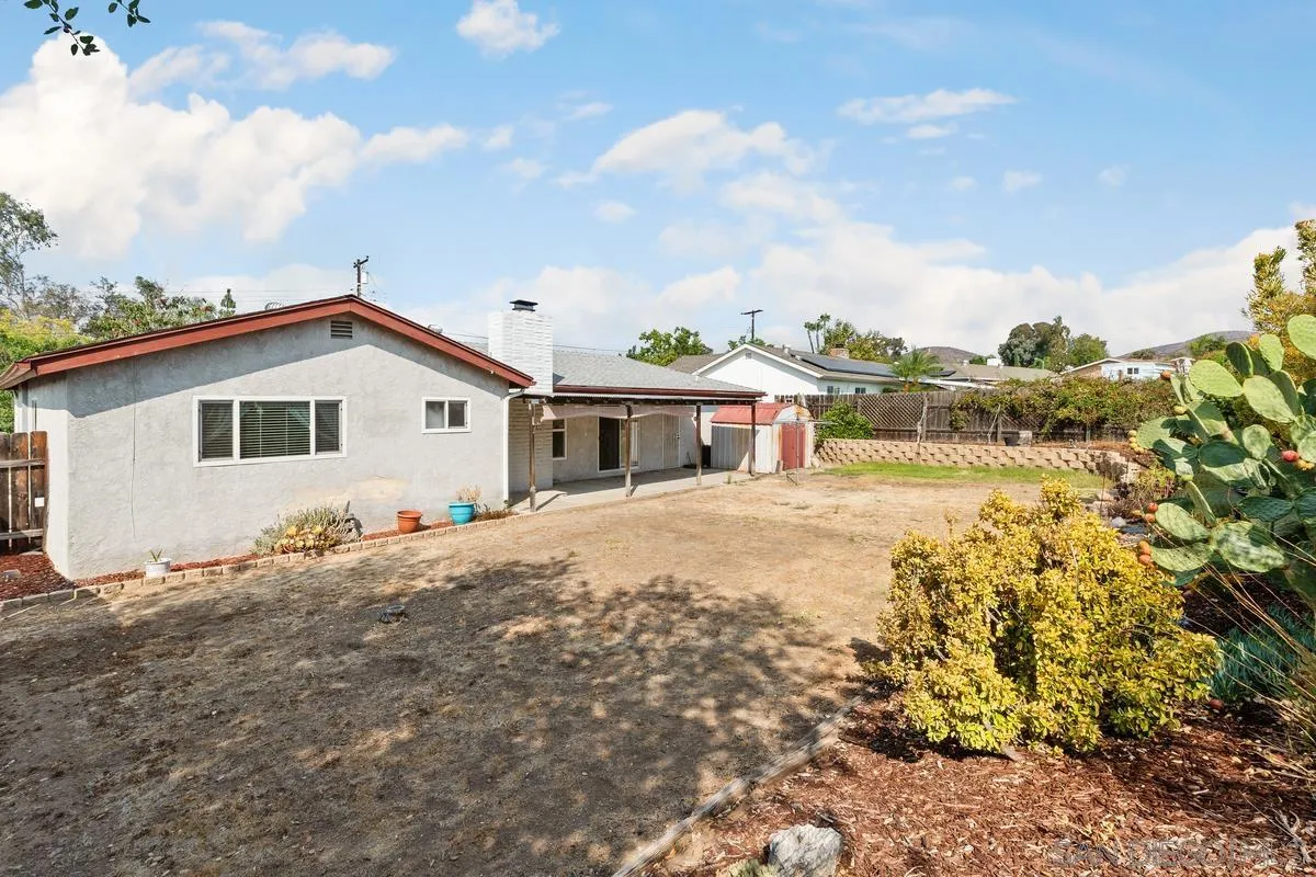 9343 Oakbourne Road Santee, CA 92071 - Photo 18 of 19 a view of a house with backyard and pool