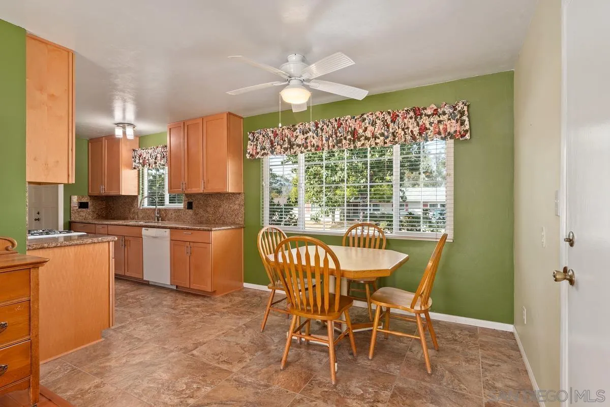 9343 Oakbourne Road Santee, CA 92071 - Photo 6 of 19 a view of a dining room with furniture window and outside view