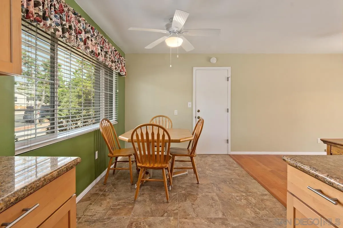 9343 Oakbourne Road Santee, CA 92071 - Photo 7 of 19 a view of a dining room with furniture window and outside view