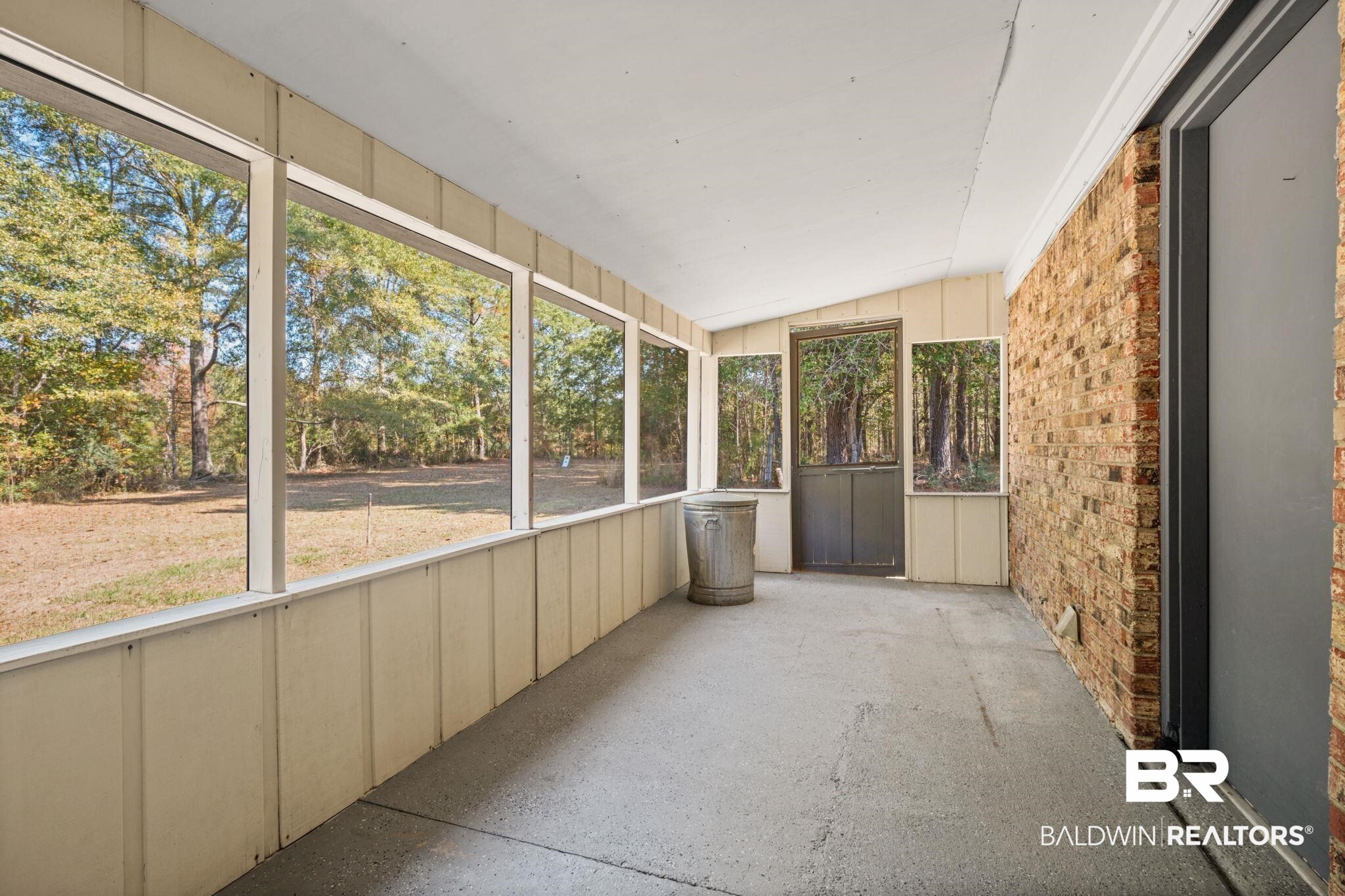1456 Herman Williams Road Fruitdale, AL 36539 - Photo 15 of 24 Unfurnished sunroom with vaulted ceiling