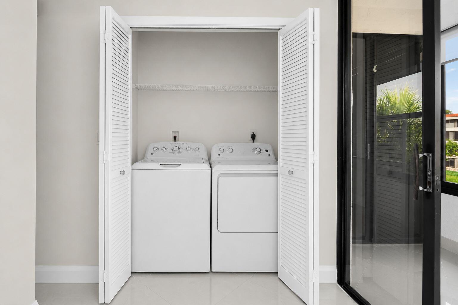 7535 La Paz Boulevard, Unit 306 Boca Raton, FL 33433 - Photo 30 of 37 laundry
