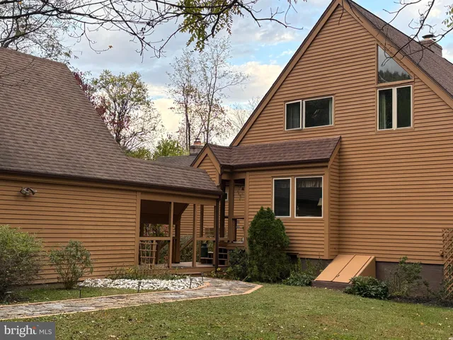 a backyard of a house with lots of green space