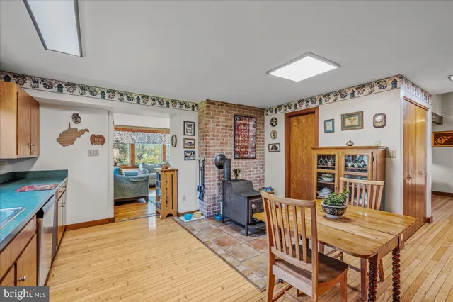 a balcony with wooden floor and furniture