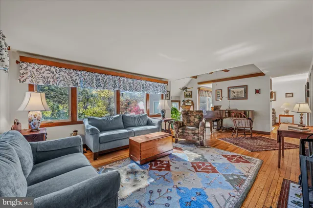 a room with a dresser and a mirror