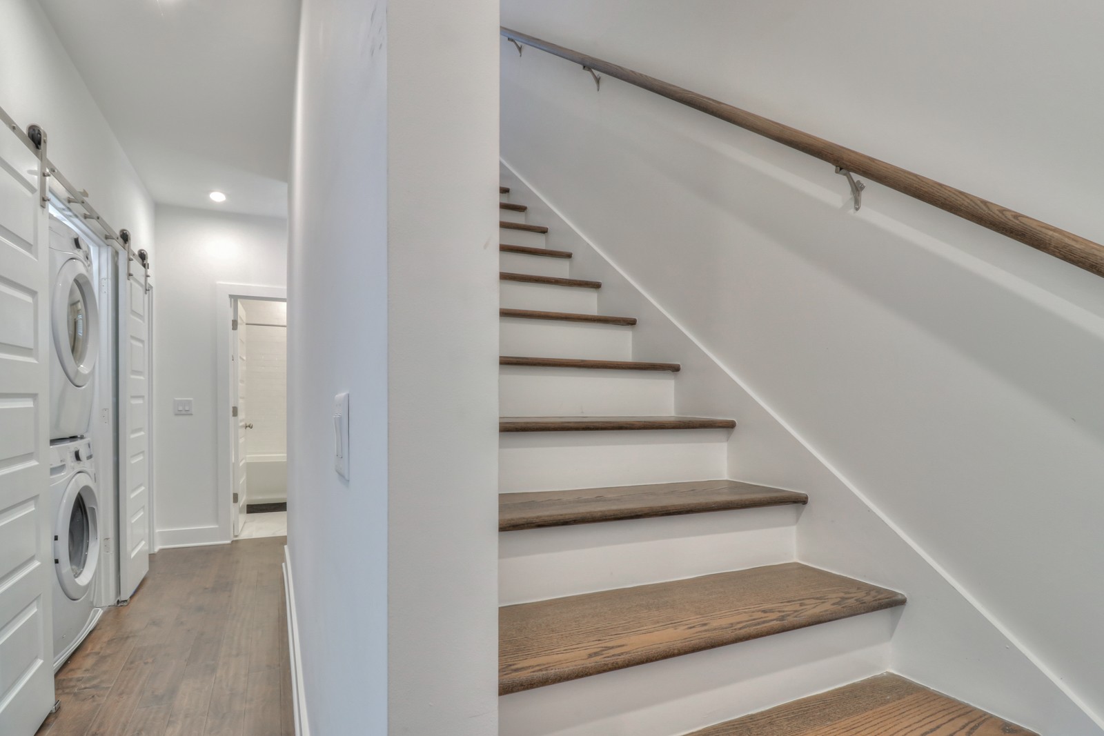 500 Creative Way, Unit 4 Madison, TN 37115 - Photo 29 of 38 a view of staircase with white walls and a rug