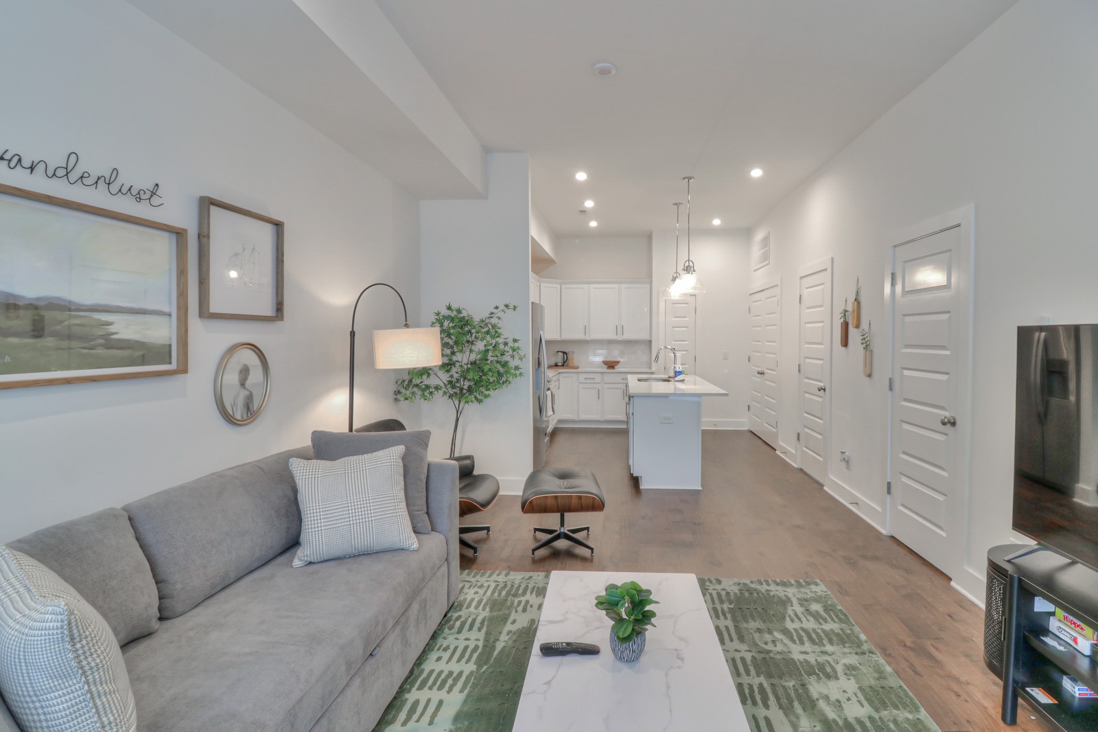 500 Creative Way, Unit 4 Madison, TN 37115 - Photo 4 of 38 a living room with furniture and a flat screen tv
