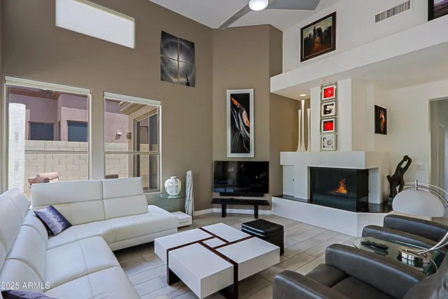 a kitchen with granite countertop a stove and a microwave
