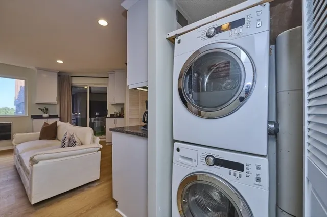 a view of living room with washer and dryer