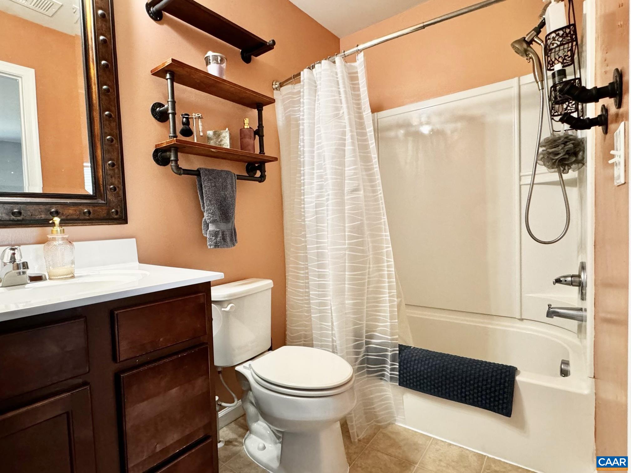155 Richards Court Ruckersville, VA 22968 - Photo 17 of 51 a bathroom with a sink a toilet and shower