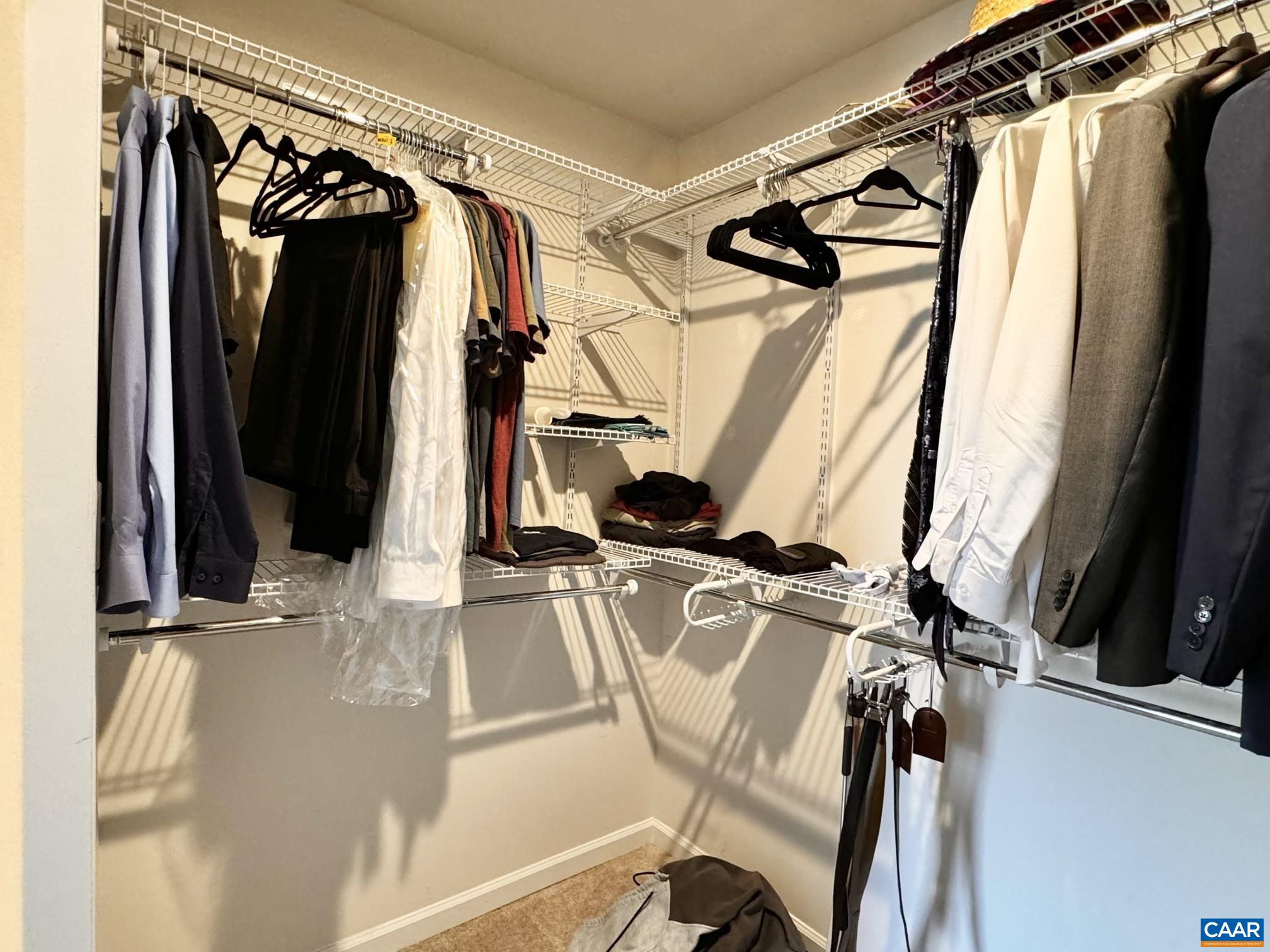 155 Richards Court Ruckersville, VA 22968 - Photo 20 of 51 a view of walk in closet with clothes and shoes