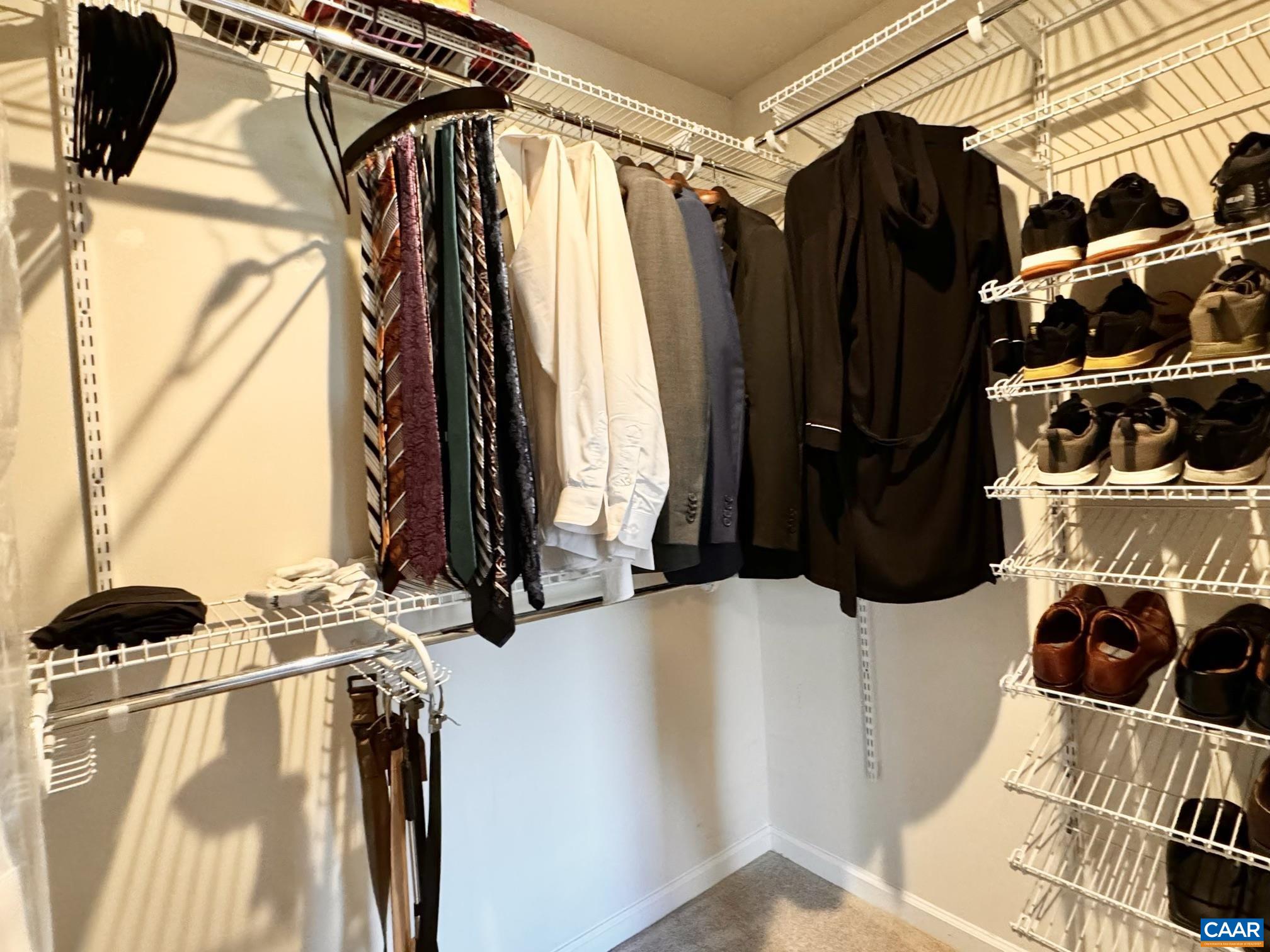 155 Richards Court Ruckersville, VA 22968 - Photo 21 of 51 a view of walk in closet with clothes and shoes