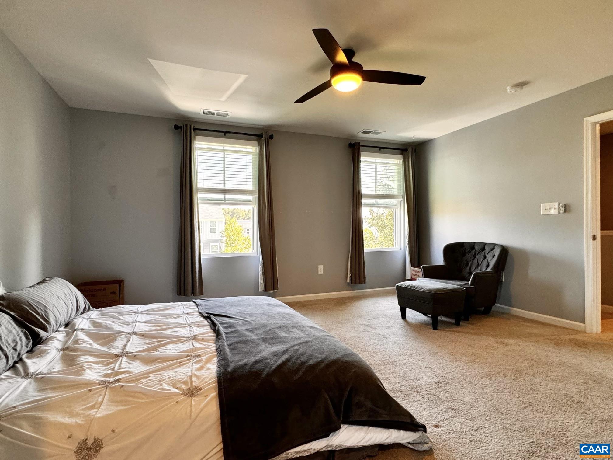 155 Richards Court Ruckersville, VA 22968 - Photo 22 of 51 a bedroom with a bed and windows