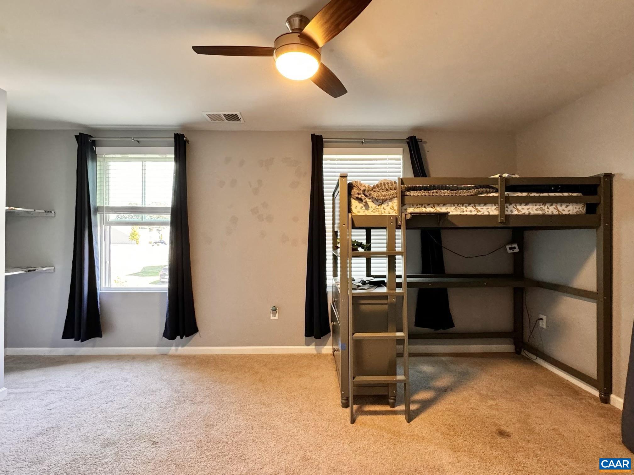 155 Richards Court Ruckersville, VA 22968 - Photo 31 of 51 a view of a room with racks on the wall