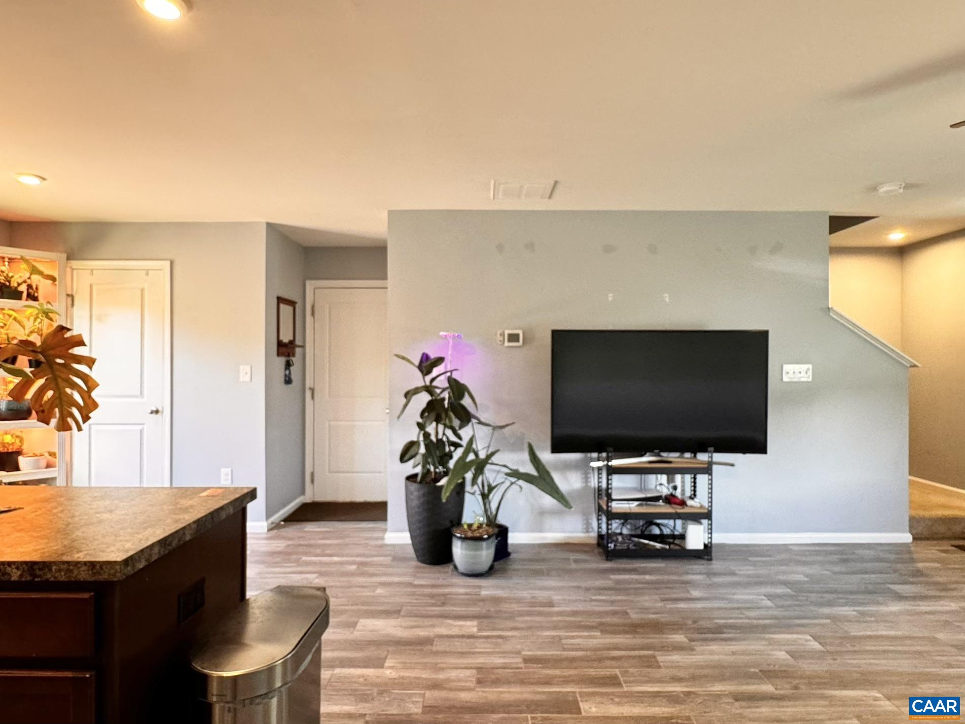 155 Richards Court Ruckersville, VA 22968 - Photo 36 of 51 a livingroom with furniture and a flat screen tv