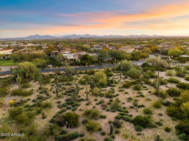 a view of a city with mountains in the background