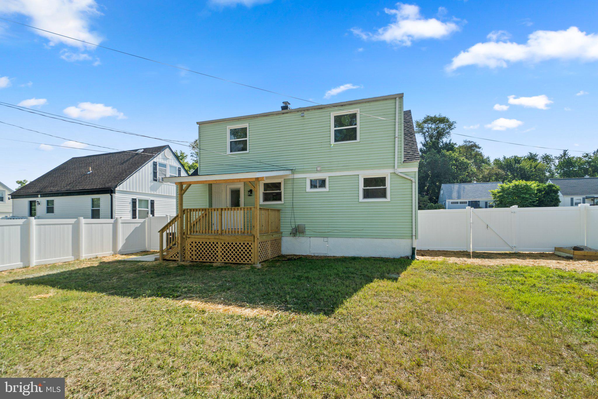 722 Templecliff Road Pikesville, MD 21208 - Photo 29 of 30 a view of a house with a yard