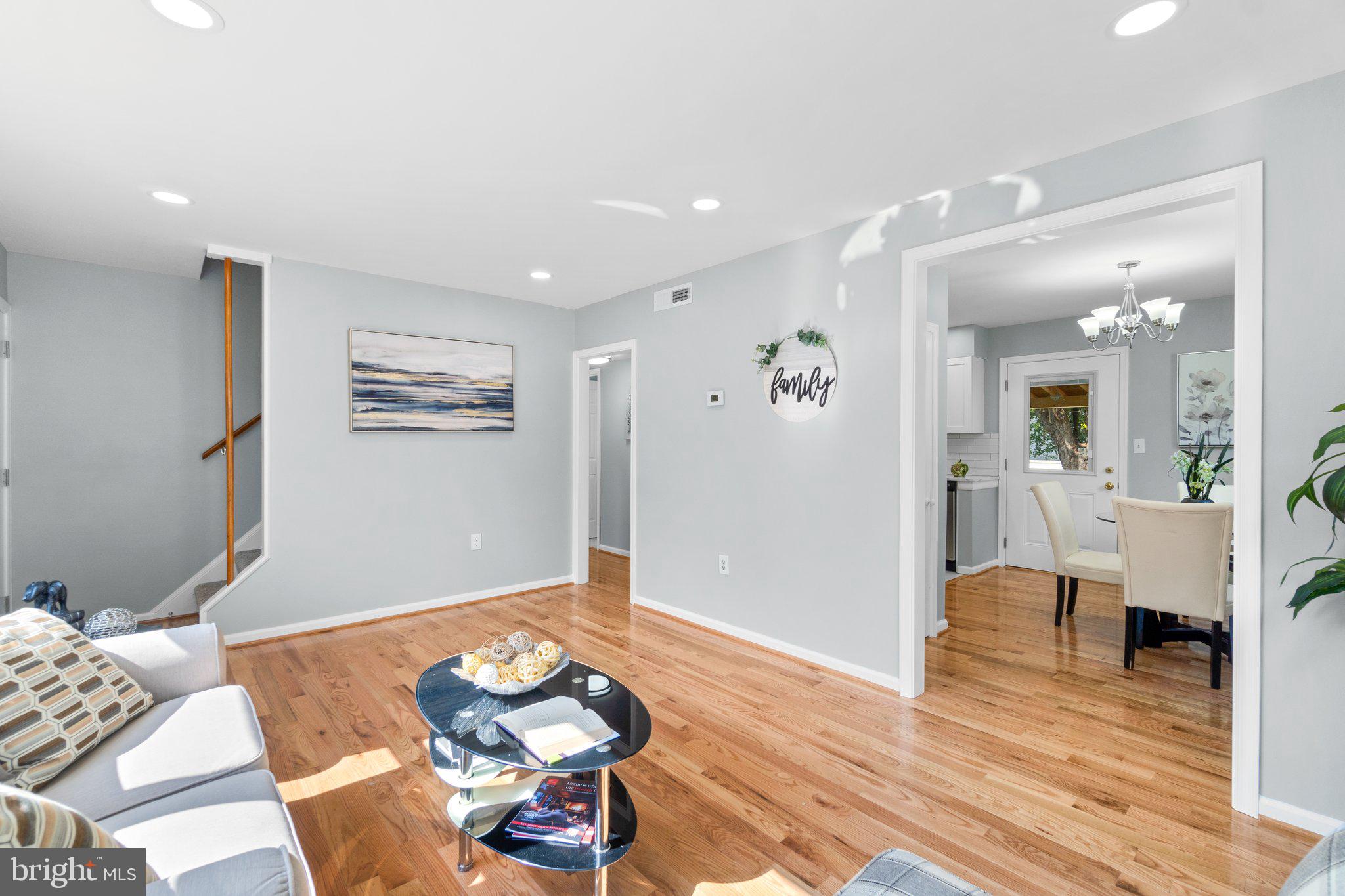 722 Templecliff Road Pikesville, MD 21208 - Photo 5 of 30 a living room with furniture and wooden floor