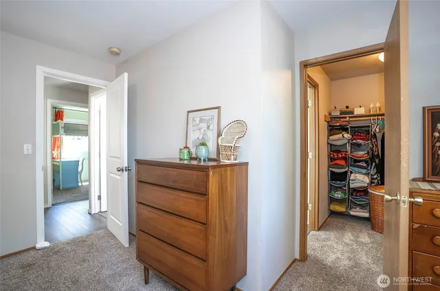 a bedroom with a bed and a cabinets