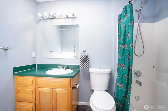 a view of a workspace with furniture