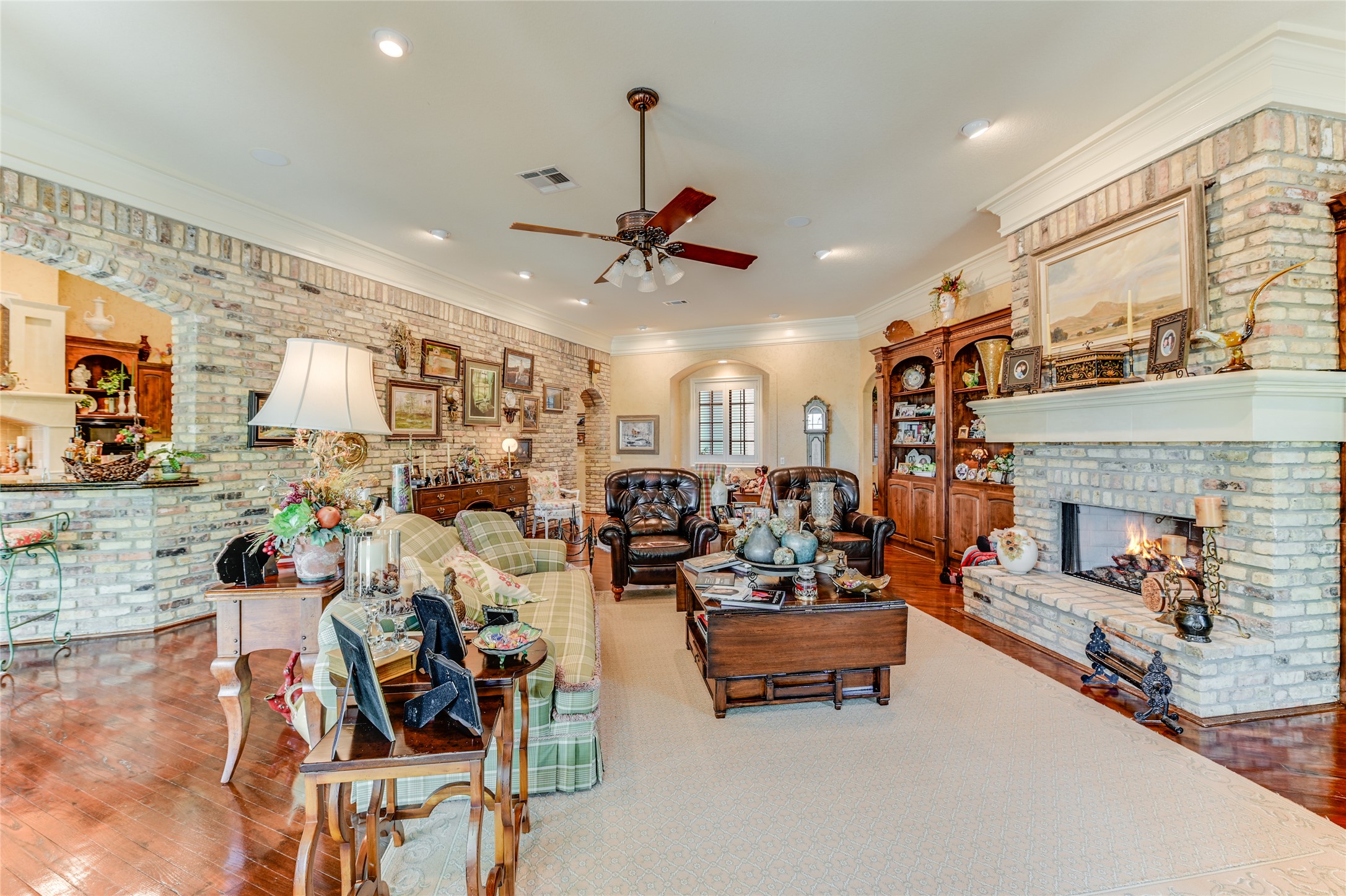 8611 Young Lane Austin, TX 78737 - Photo 12 of 40 a living room with furniture and a fireplace