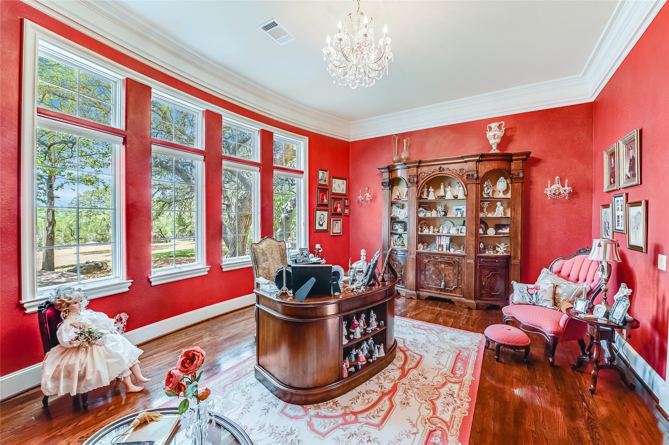 8611 Young Lane Austin, TX 78737 - Photo 14 of 40 a living room filled with furniture and a potted plant