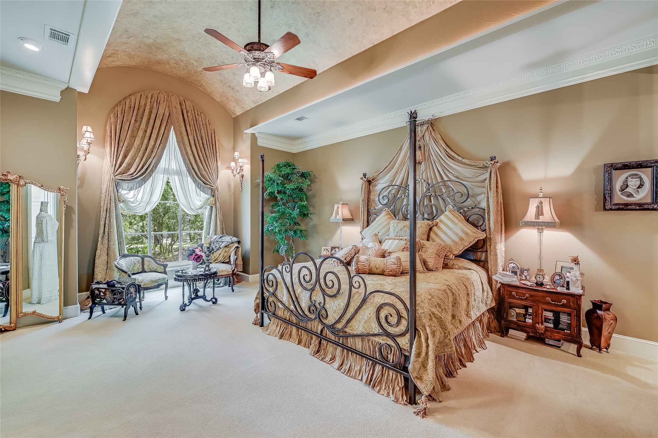 8611 Young Lane Austin, TX 78737 - Photo 16 of 40 a bedroom with furniture and a large window