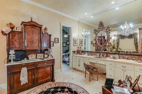 a view of staircase with a dining table chairs