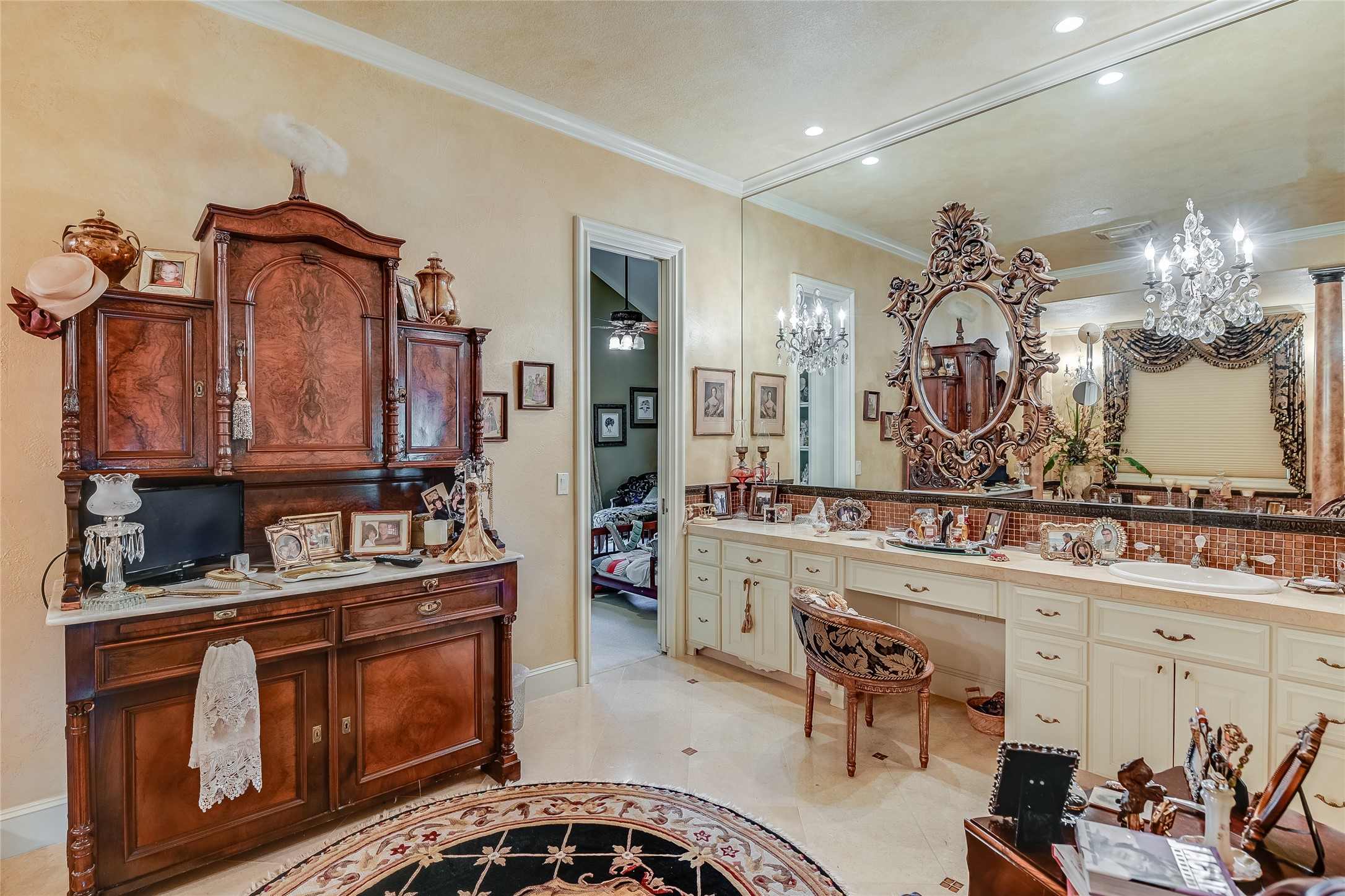 8611 Young Lane Austin, TX 78737 - Photo 18 of 40 a bathroom with a sink double vanity and a mirror