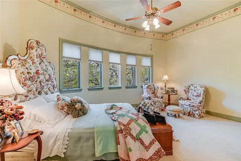 a view of a chairs and table in a room