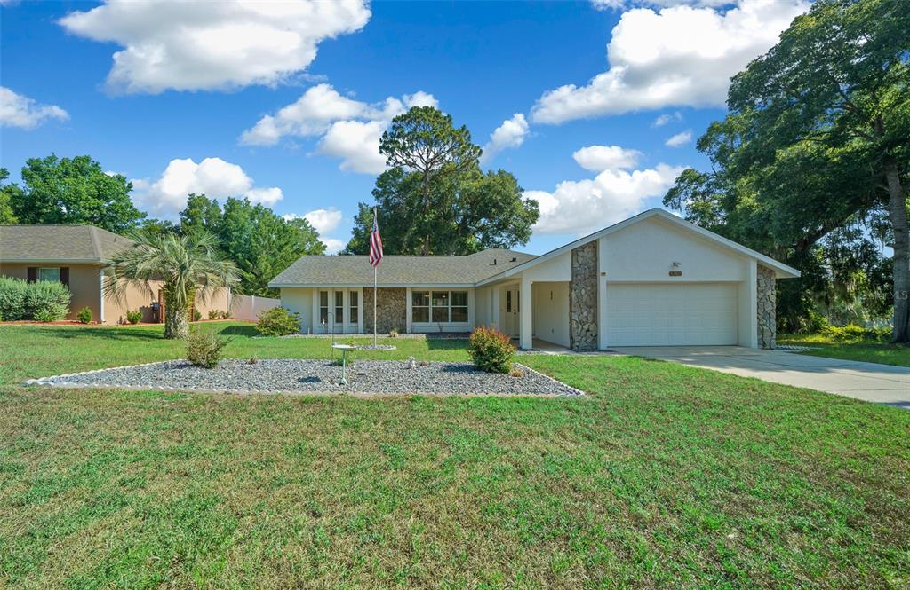 13027 Northeast 7th Loop Silver Springs, FL 34488 - Photo 1 of 55
