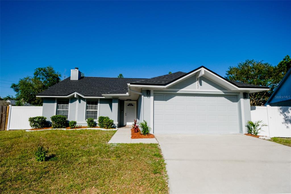 Undisclosed Address Brandon, FL 33511 - Photo 1 of 1 a front view of a house with yard