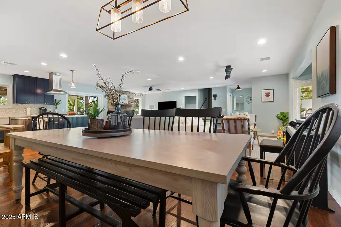 1675 East Appalachian Road Flagstaff, AZ 86004 - Photo 11 of 26 a view of a dining room with furniture and a kitchen