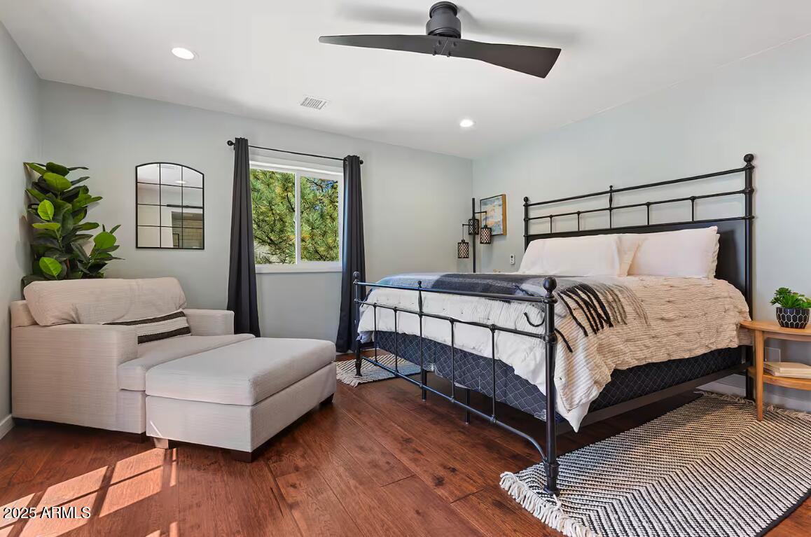 1675 East Appalachian Road Flagstaff, AZ 86004 - Photo 13 of 26 a bedroom with a bed and window