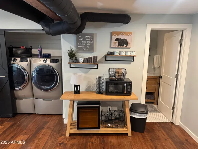 a bedroom with furniture and a fireplace