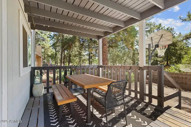 a view of a balcony with furniture