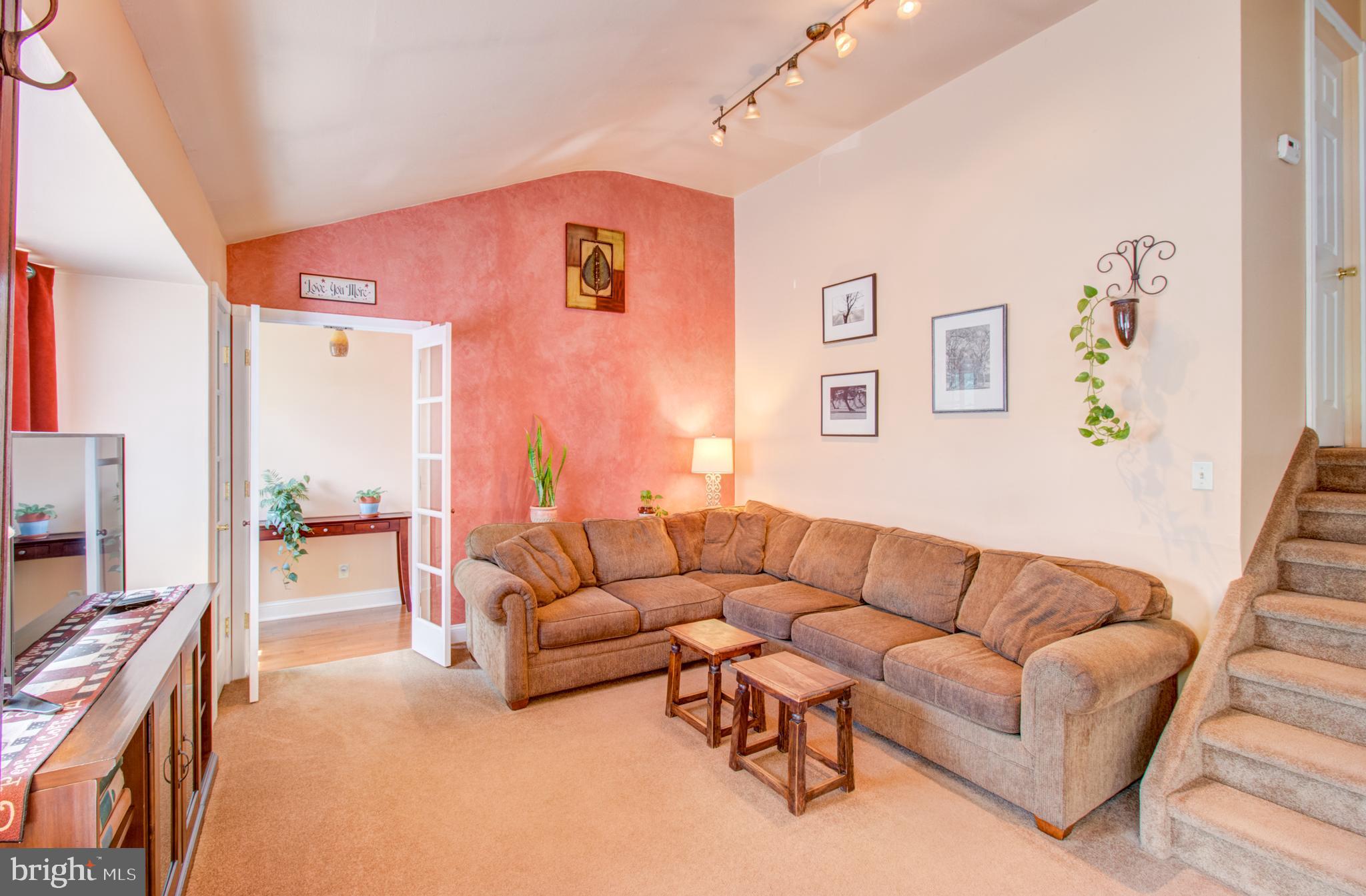 30 Dover Road Hamilton, NJ 08620 - Photo 17 of 32 a living room with furniture and a flat screen tv