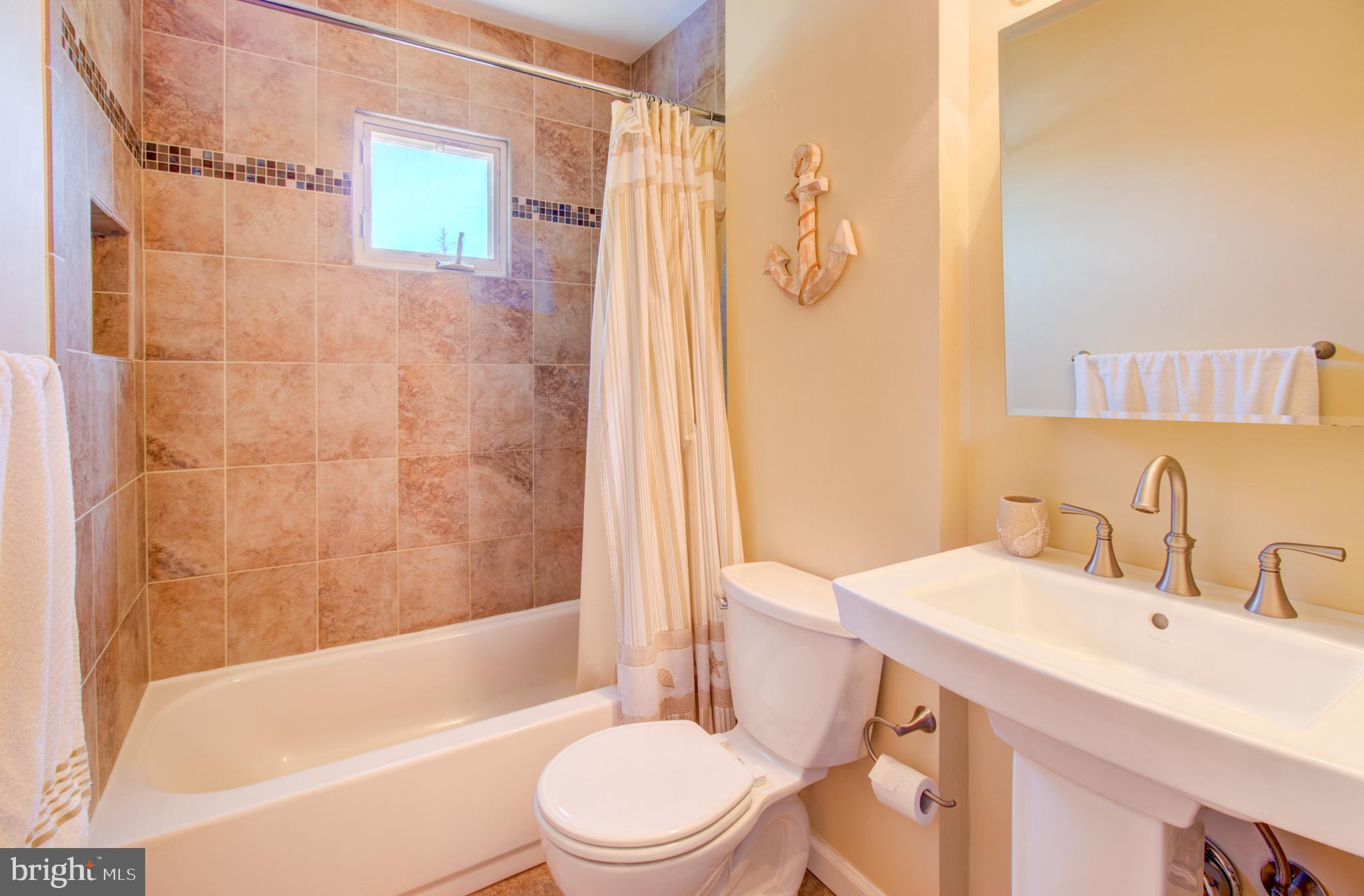 30 Dover Road Hamilton, NJ 08620 - Photo 22 of 32 a bathroom with a sink toilet and shower