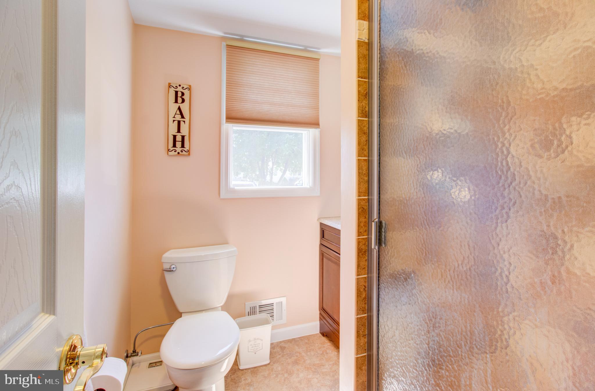 30 Dover Road Hamilton, NJ 08620 - Photo 26 of 32 a white toilet sitting next to a bathroom sink