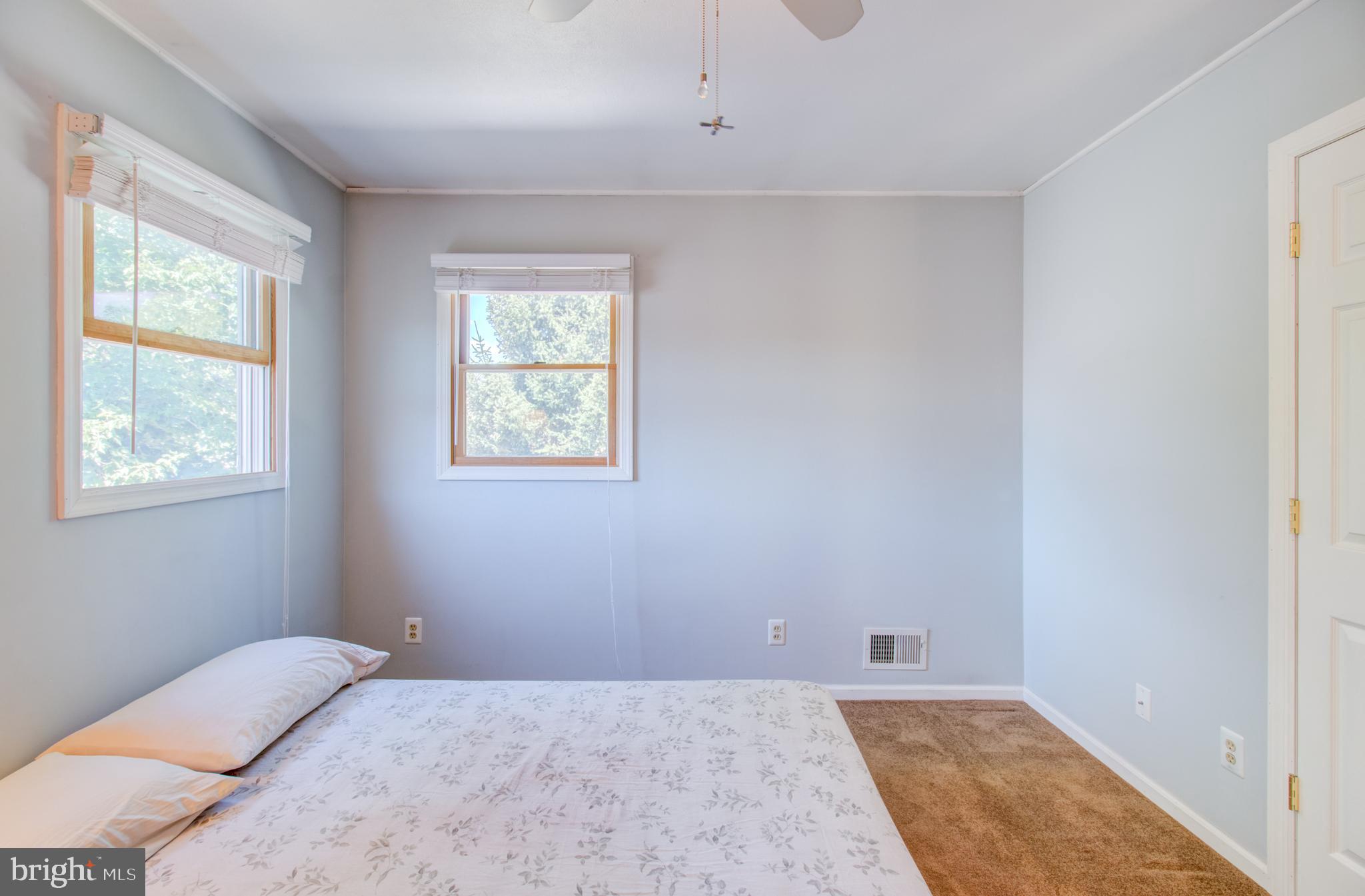 30 Dover Road Hamilton, NJ 08620 - Photo 29 of 32 a bedroom with a bed and a window