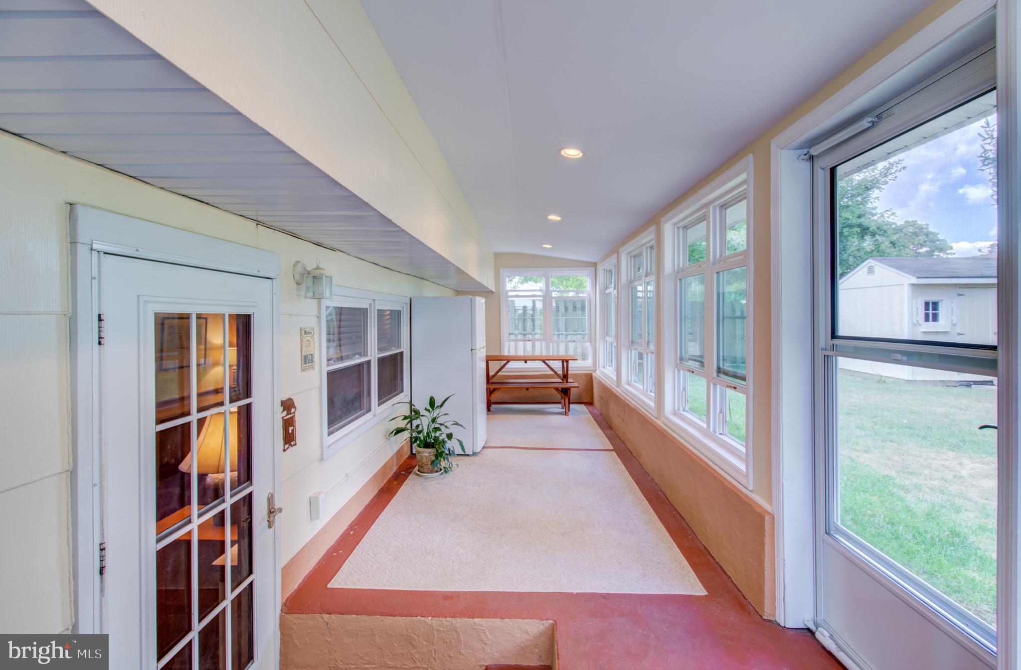 30 Dover Road Hamilton, NJ 08620 - Photo 5 of 32 a hallway with wooden floor and windows