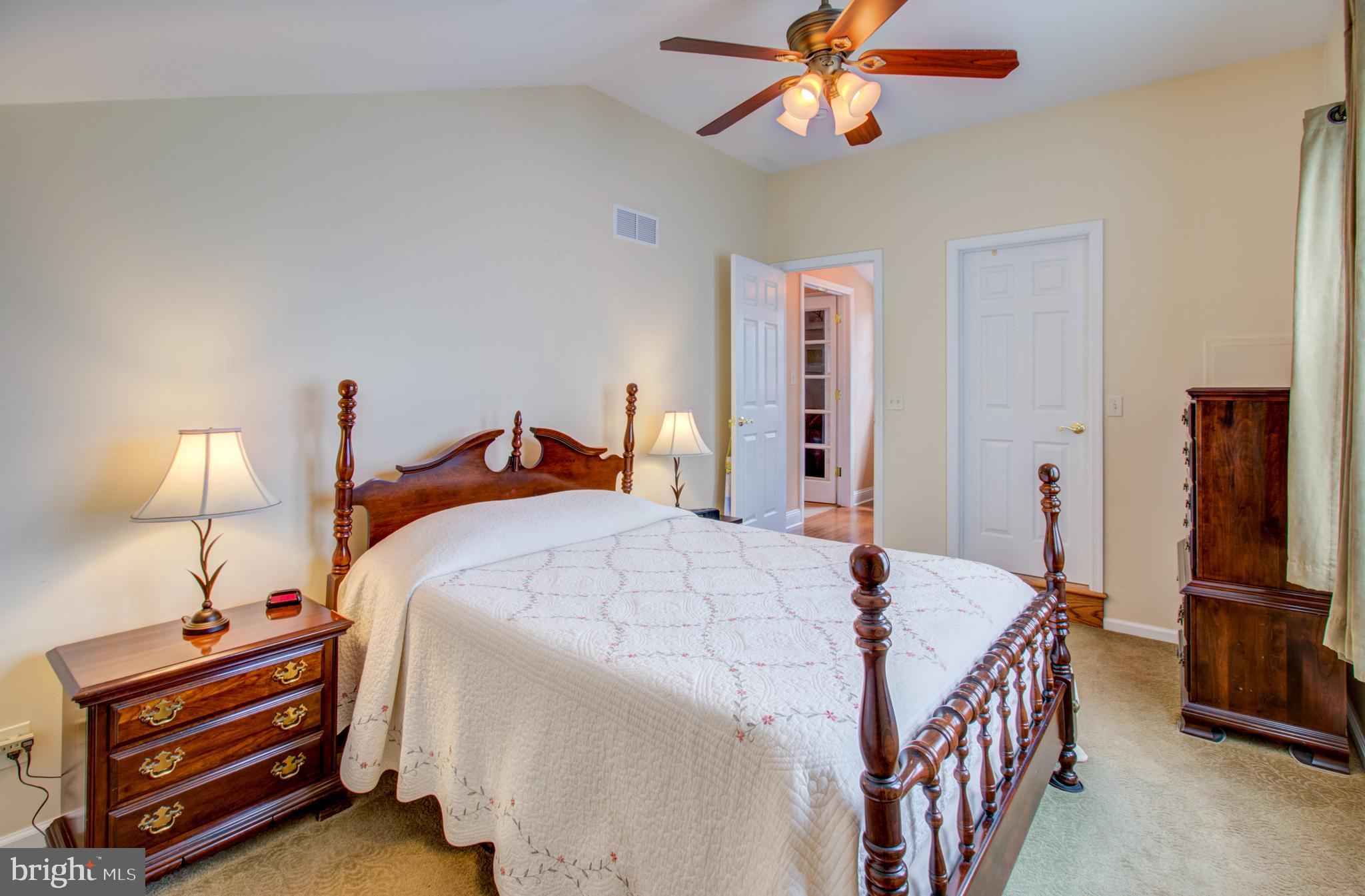 30 Dover Road Hamilton, NJ 08620 - Photo 10 of 32 a bedroom with a bed and a chandelier