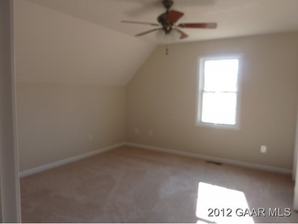 6 Nursery Road Lyndhurst, VA 22952 - Photo 5 of 5 an empty room with a window and a fan