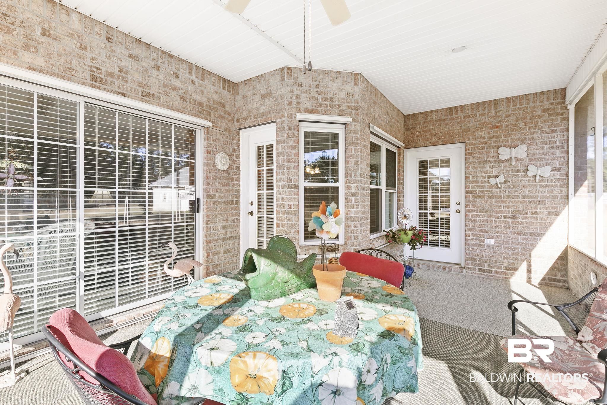 24130 Cowling Road Robertsdale, AL 36567 - Photo 45 of 71 View of sunroom