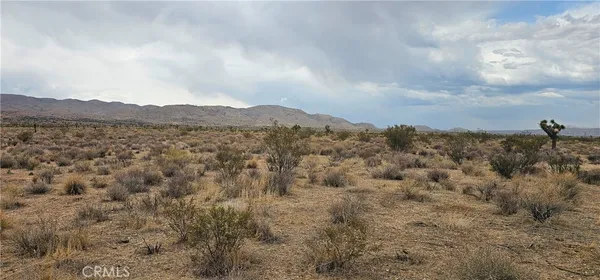 a view of a mountain in the distance in a city