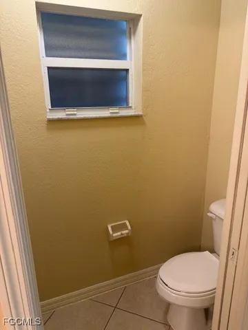 a bathroom with a toilet